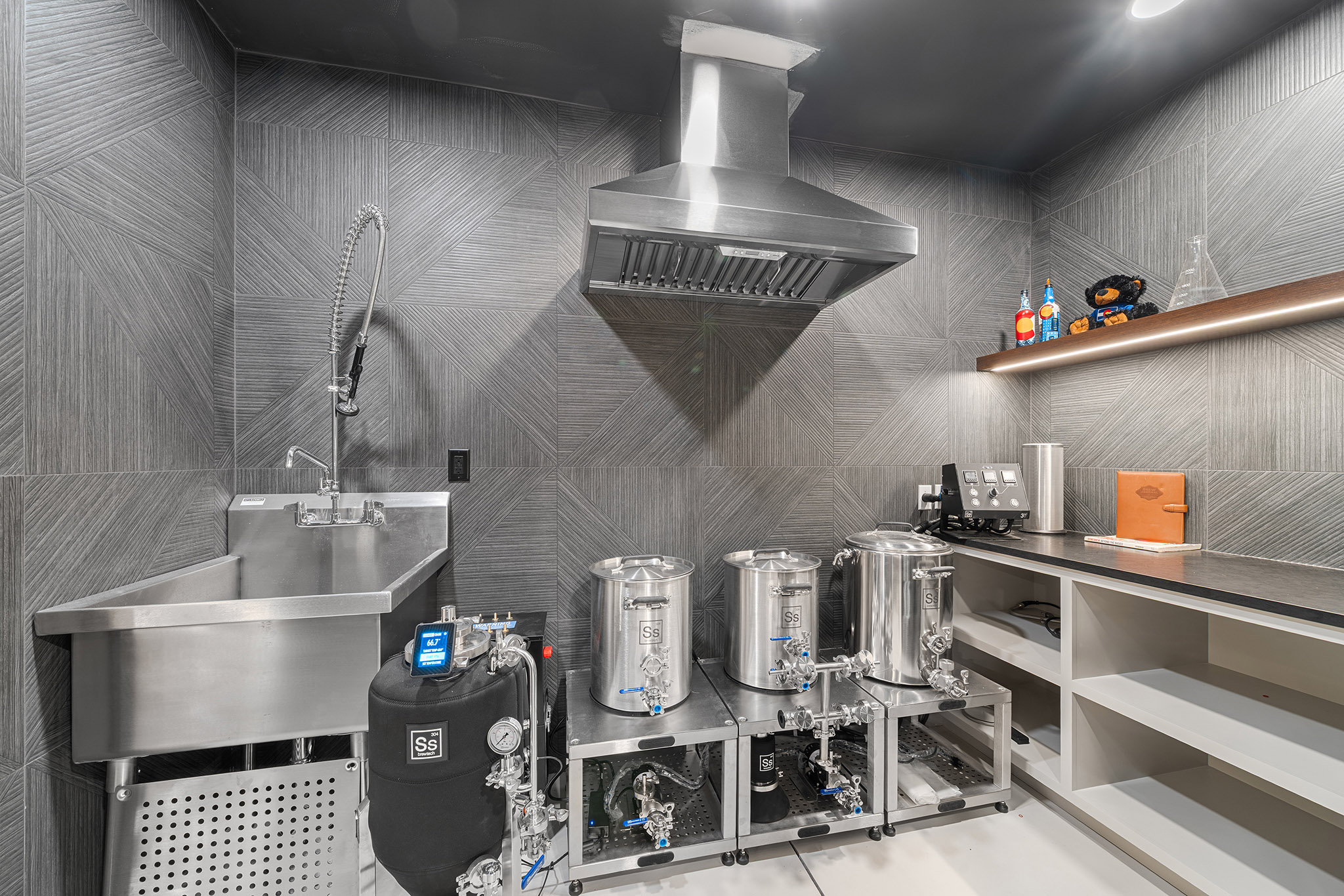 Domers Construction - Integrated and transformed unfinished garage and basement into indoor play area, mudroom, home gym, home brew bar, office, bathroom and bedroom